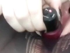 My wife drills her cunt with a dildo through the hole in her pantyhose