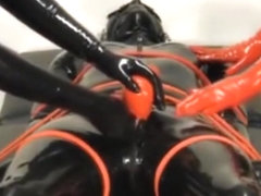 Dressing up rubber slave