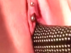 Hot ass blonde toying her pierced pussy in close-up
