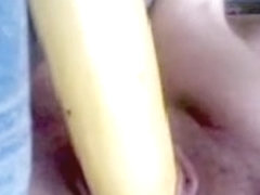 Rubbing my cunt with a sweet banana