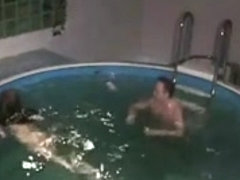 Handjob and sex with skinny brunette in the pool