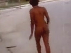 Ebony babe walks naked on the street