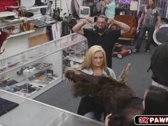Sexy lesbian hotties shares cock inside the pawn shop