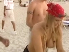 Kinky girls tease hard in a hot voyeur beach group fun
