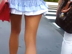 candid voyeur gorgeous model in blue ruffle skirt