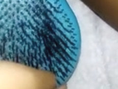 Slut with a brush squirts