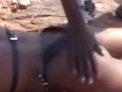 Submissive African Girl Gets Spanked While Lying On Floor