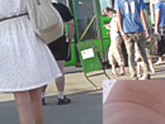 Blonde-haired girl with slender forms in upskirts video