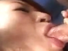 Japanese slut blows penis in close-up