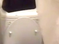 Hidden cam masturbating girl in the toilet gets orgasm