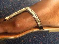 Ultra Close-Up of Beautiful Ebony Feet on the Train