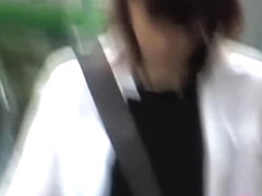 White shirt on and brown skirt sharking while slowly pacing