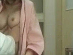 Horny asian gets tits out for her doctor and loves it