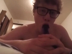Short-haired Mature With Glasses Deepthroats A Big Black Sex Toy