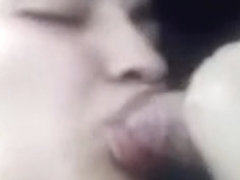 Cute Gal Blows Her BF's Penis Closeup In His Car