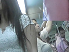 Girl talks away with gf and gets filmed on upskirt cam