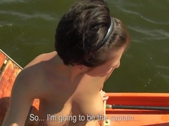 Seductive chick is giving nice blowjob on a boat