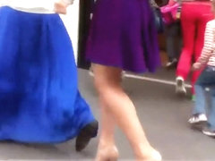 Upskirt look under milf's purple skirt