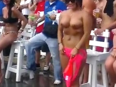 Fat guy gets a wild lap dance from topless girl