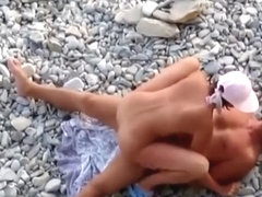 Nudist woman fucked in rocky beach