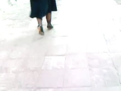 Mature babe walking in black heels