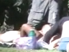 Old and nasty swingers in the park having threesome sex