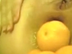 Huge dildo and mandarins in my asshole