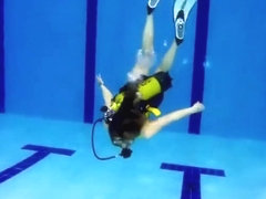 scuba girl in pool