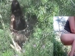 Woman spied peeing outdoors in the bushes