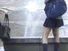Fountain sharking action with two Asian schoolgirl being in the middle of it
