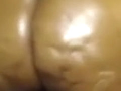 black mom with big oiled ass riding on a toy