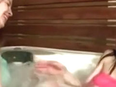 Lesbian Brunettes Licking In A Hot Tub