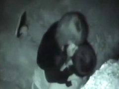 Voyeur tapes a partygirl sucking and riding a guy's cock at the beach at night