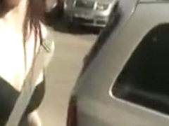 Chick banged in her ass behind a fence