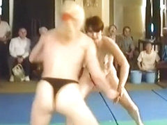 Topless Housewives mat wrestling
