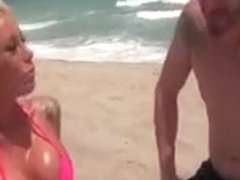 Dirty Blonde Milf Tanning At The Beach Gets All Oiled Up