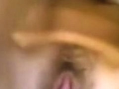 A latina girl doing a show in webcam. She show her HUGE boobs and get her dildo. After she cum she.