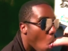 Black gang dude gives white guy head and ass