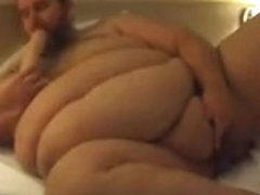 Chubby superchub jerkin-off at a hotel room up to cum discharged