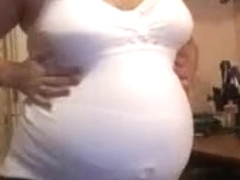 Pregnant slut exposing her big tits