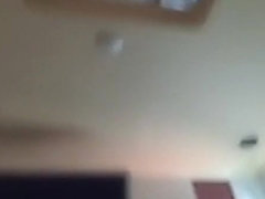 Guy tapes his brunette gf giving him a pov blowjob on the bed with his cellphone