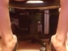 Black and silver high heel pumps and upskirts