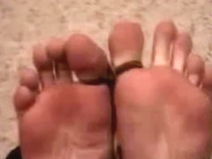 guy hogtied barefoot