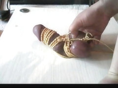 Mistress teases and milks tied gloryhole cock