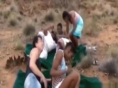 Ebony slave girl fucked by two guys in the nature