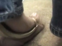 Cock trampling sandal