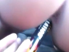 Solo beauty disrobes and masturbates in her car