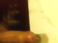 Milking my prostate in the bathroom.