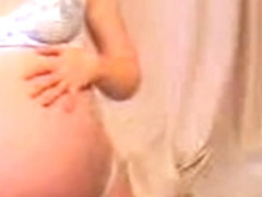 Pregnant babe gets naked on webcam