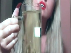 Chick pisses in a glass and rips a few farts